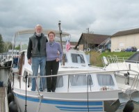joan-and-neil-malling-on-their-boat "the Estate"